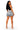 A woman modeling a pair of heavily distressed, frayed-hem light-wash denim shorts with a silver metal rivet detail at the back waist, paired with a black crop top and nude high heels against a white background.