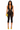 Front view of black sheer lace halter capri romper with plunging neckline, bodycon fit, yellow patent heels, and clutch.