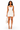 A woman modeling a white halter-neck bodycon mini dress, holding a small white handbag, against a plain white background.