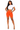 Woman wearing a white crop top and orange shorts on a white background