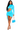 Woman wearing a bright blue dress with cut-out design on a white background