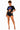 Swagg Boutique model Ari wearing a black graphic tee styled with black denim shorts, showing how graphic tees can be dressed up for a fashionable casual look.